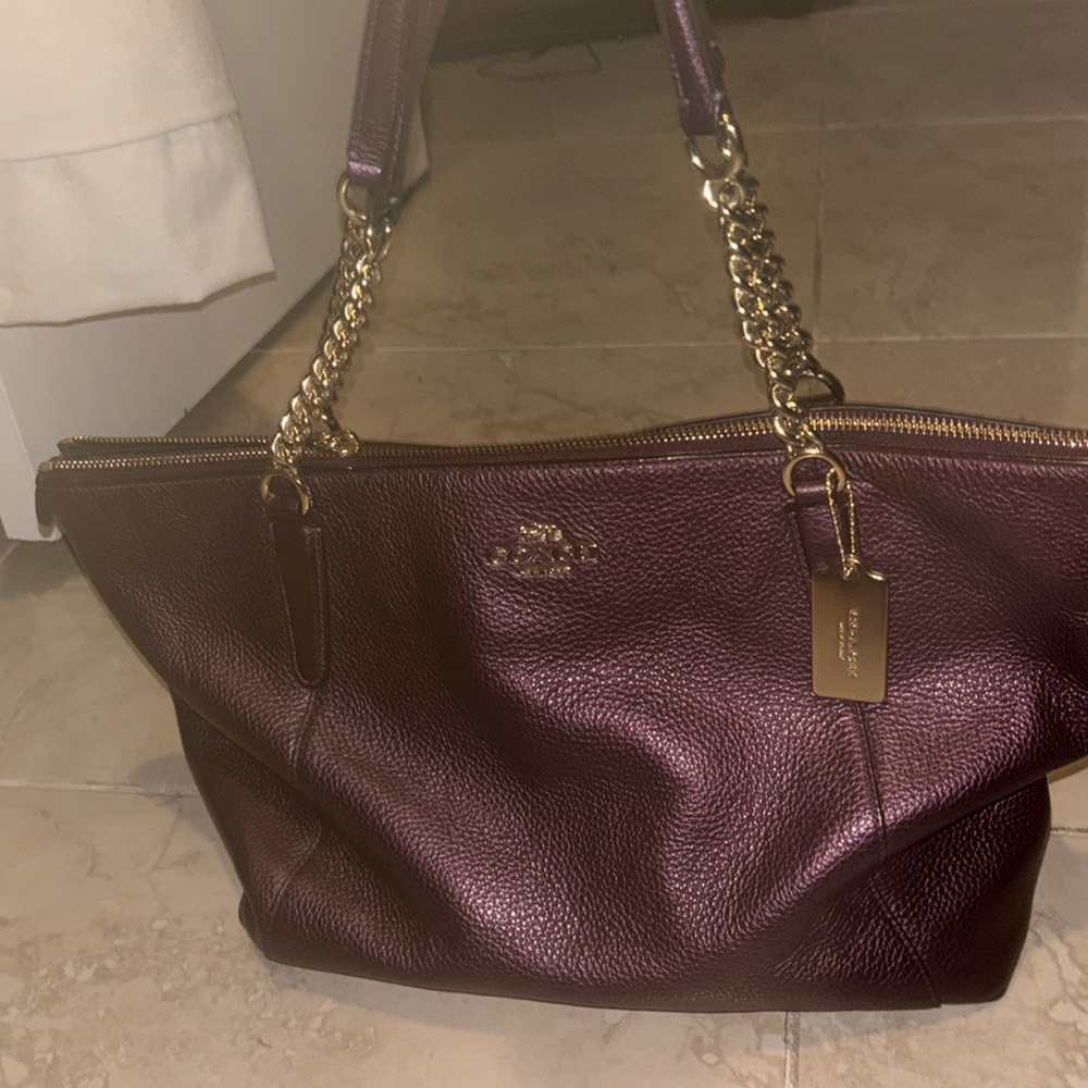 Gently used purple Coach tote.